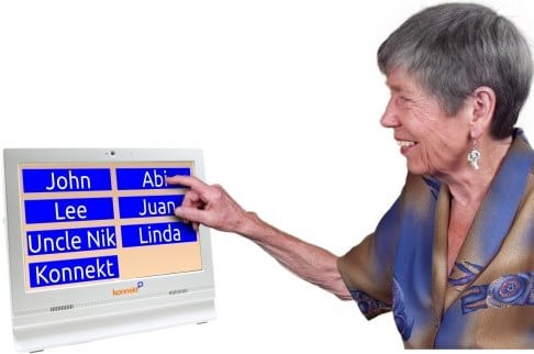 Grandma making a one-touch call using a Konnekt Videophone