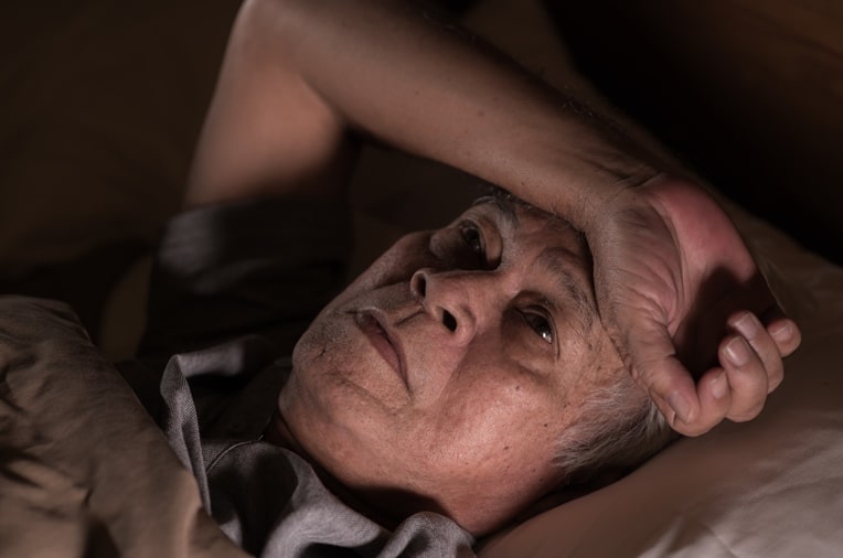 Man cannot sleep due to light from a tablet